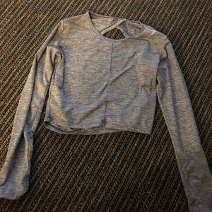 Nikki B x Gymshark season 1 grey crop top